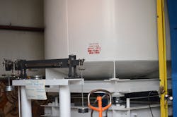 Gravimetric calibration (weigh scale). (Courtesy of CEESI) Gravimetric calibration (weigh scale). (Courtesy of CEESI)