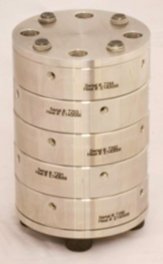 Stack of four Equilibar Research Series backpressure regulators in a space-saving design. Each regulating unit includes inlet, outlet, and pilot ports with HPLC fitting ports.
