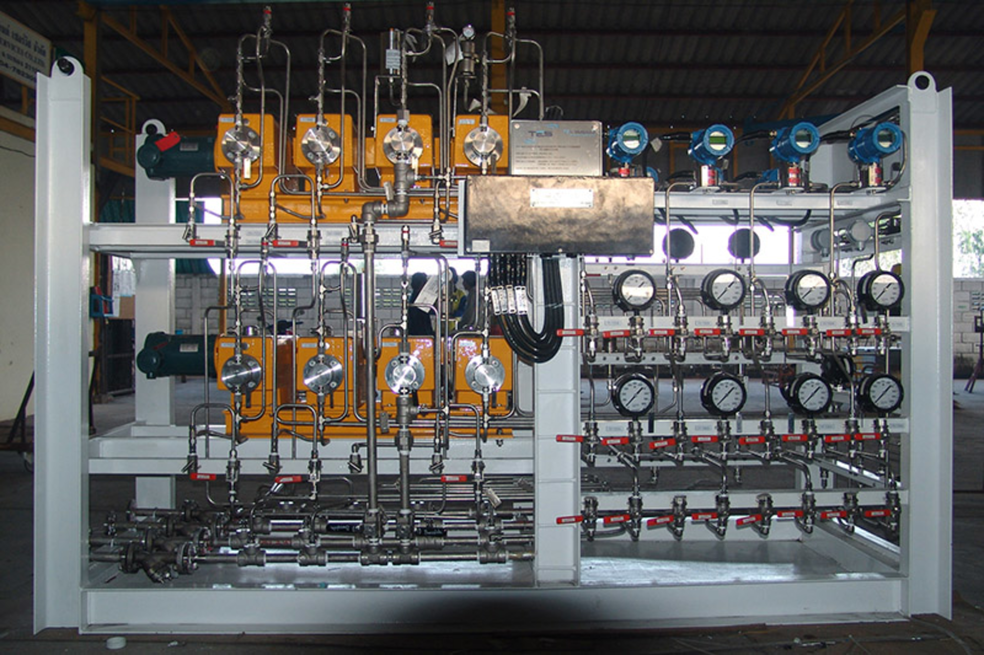Positive displacement meters in a chemical skid. Courtesy of AW-Lake Company