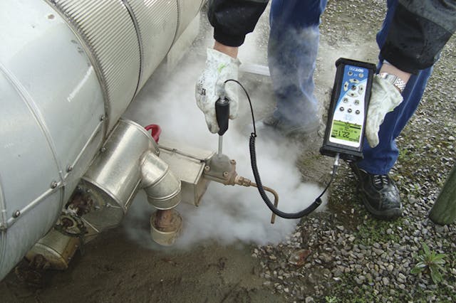 An ultrasound data collector inspects a thermostatic steam trap with a sensor. Photo courtesy of SDT.