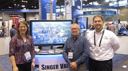 Flow Control Editor in Chief Robyn Tucker (left) and Account Executive Addison Perkins (right) with Singer Valve&rsquo;s Mark Gimson (center) at AWWA ACE16.