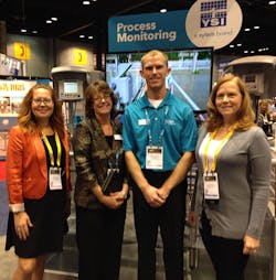 Flow Control Southeast Account Manager Lisa Williman (far left) and Editorial Director Lori Ditoro (far right) with the Xylem analytics team at WEFTEC 2015.