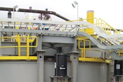 Solid slurry feeds into the tank, where it is neutralized. All graphics courtesy of CGIS Inc. Solid slurry feeds into the tank, where it is neutralized. All graphics courtesy of CGIS Inc.