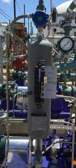 Seal pot with with top-mounted guided wave radar transmitter. Seal pot with with top-mounted guided wave radar transmitter.