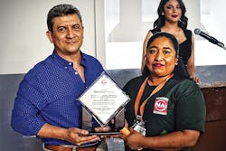 Carlos Canez, NAI&rsquo;s director of operations in Mexico, presents a Defect-Free Award trophy to employees of Plant #2 in recognition of their outstanding achievement. Graphic courtesy of NAI