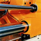 Closeup of hydraulic cylinders on industrial equipment where proper surface finish is critical for a long service life.
