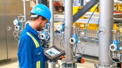 Figure 1. With Bluetooth, a technician can access a temperature instrument from up to 40 feet away using an Endress+Hauser Field Xpert SMT70 handheld tablet PC tool.