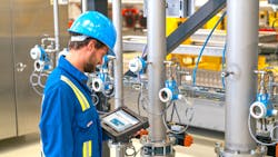 Figure 1. With Bluetooth, a technician can access a temperature instrument from up to 40 feet away using an Endress+Hauser Field Xpert SMT70 handheld tablet PC tool. Figure 1. With Bluetooth, a technician can access a temperature instrument from up to 40 feet away using an Endress+Hauser Field Xpert SMT70 handheld tablet PC tool.