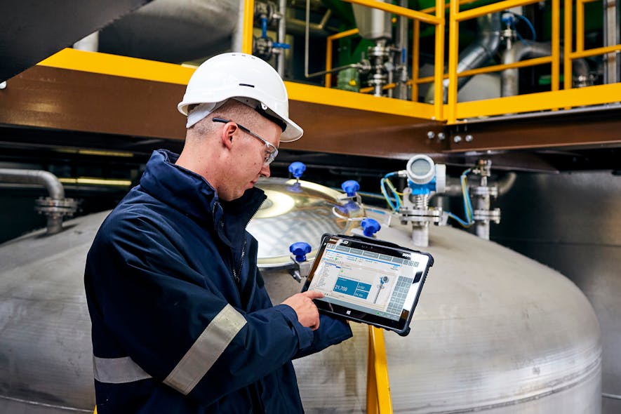 Figure 3. With Bluetooth wireless communications, a technician with a handheld device, such as an Endress+Hauser Field Xpert SMT77 tablet computer, can activate a proof-test from up to 40 feet away from the level instrument, making it easier to perform tests on level instruments installed at the top of tanks or in inaccessible locations.