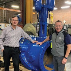 John Ballun and Rob McDonald standing next to a 30' Tilted Disc Check Valve at Val-Matic’s Elmhurst facility. John Ballun and Rob McDonald standing next to a 30' Tilted Disc Check Valve at Val-Matic’s Elmhurst facility.