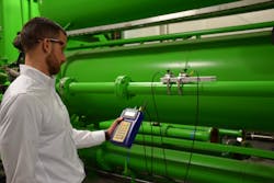 Figure 4: Portable ultrasonic flow metering of a water line. Figure 4: Portable ultrasonic flow metering of a water line.