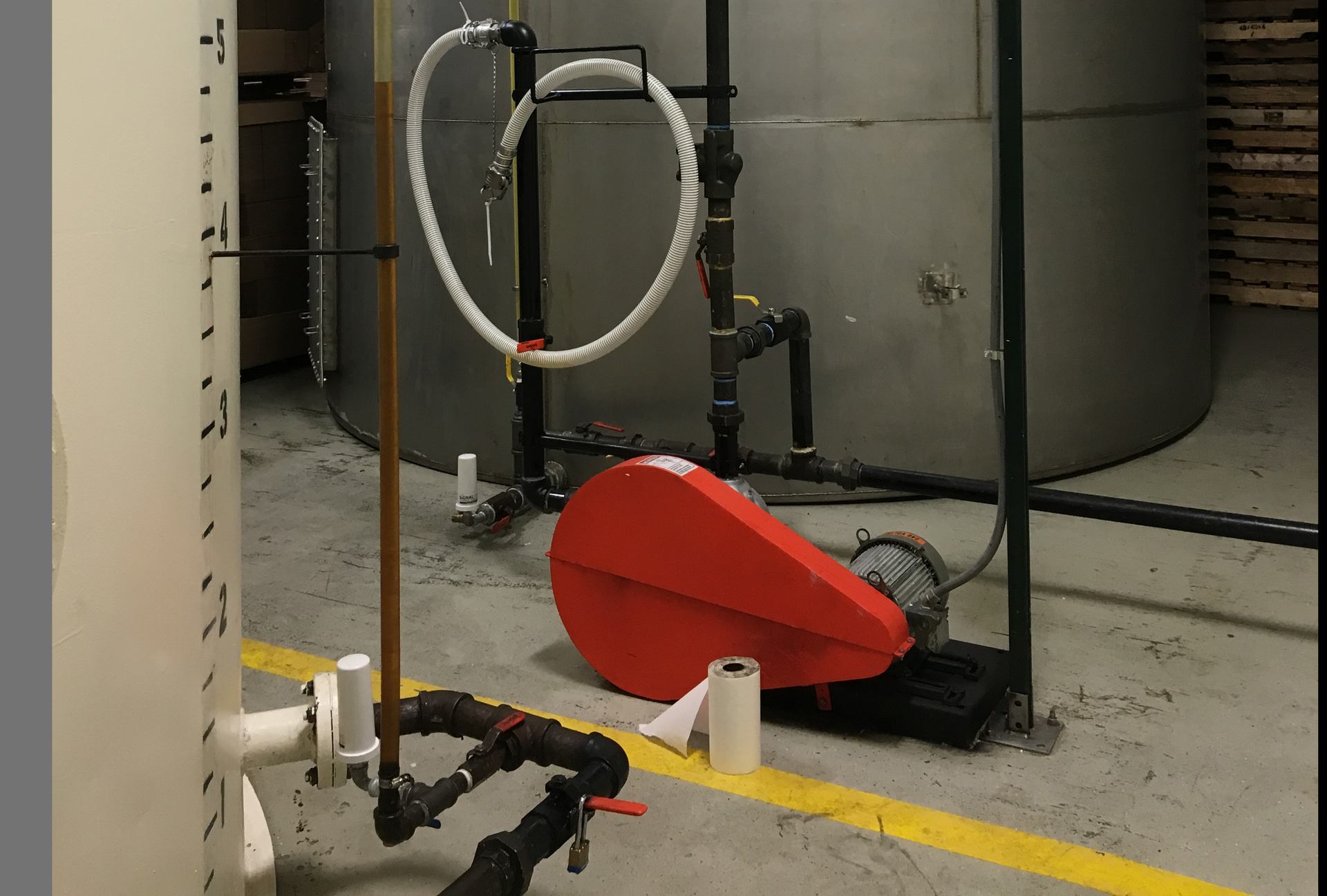 Two 20-foot tanks located inside the tortilla products processing facility hold supplies of virgin and wasted cooking oil.