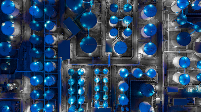 Figure 1. Aerial view of a tank farm at night.