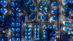 Figure 1. Aerial view of a tank farm at night. Figure 1. Aerial view of a tank farm at night.