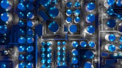 Figure 1. Aerial view of a tank farm at night. Figure 1. Aerial view of a tank farm at night.