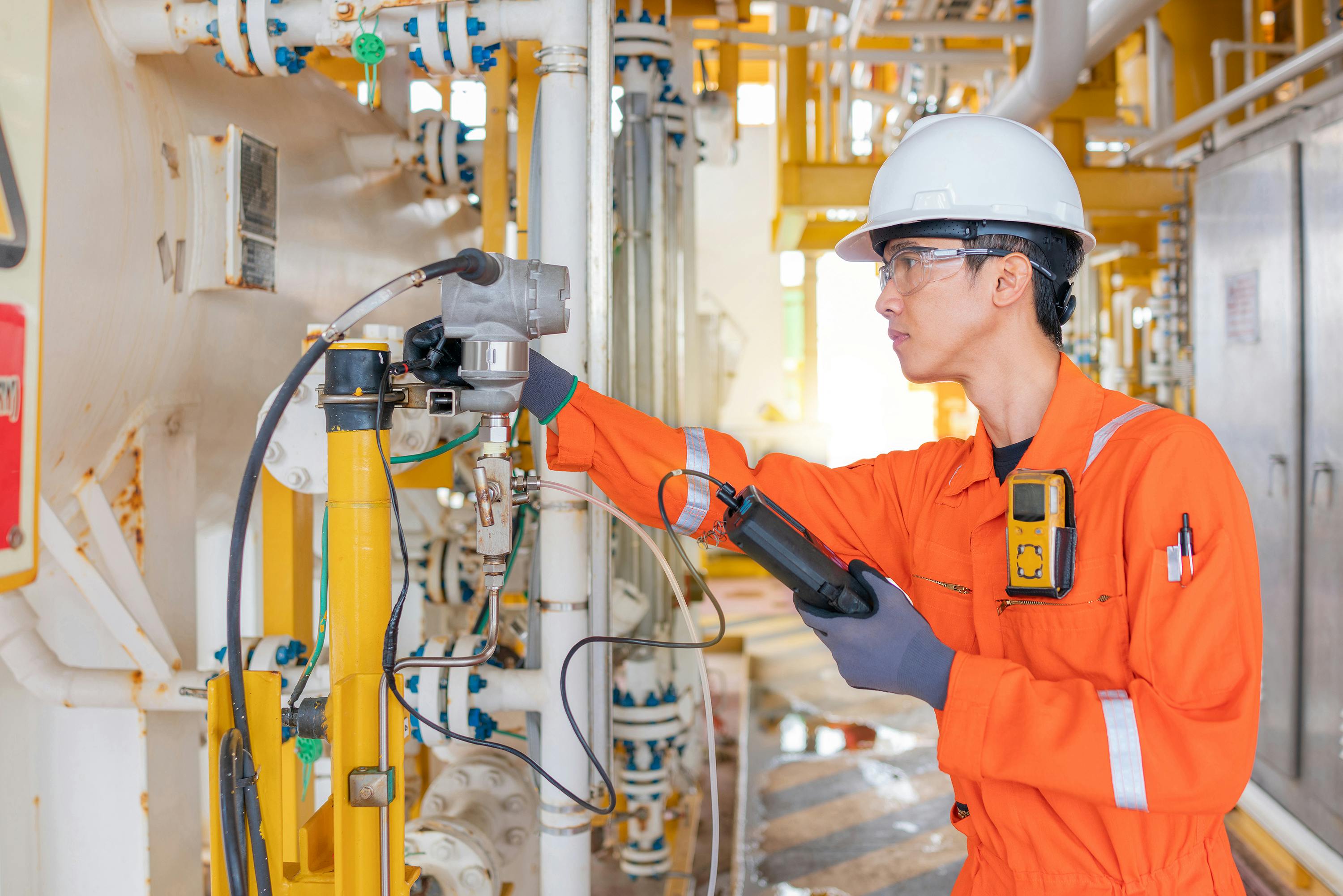 Figure 1: The traditional method for reading diagnostic data was via a hand-held communicator, but now there are more options, including Bluetooth.