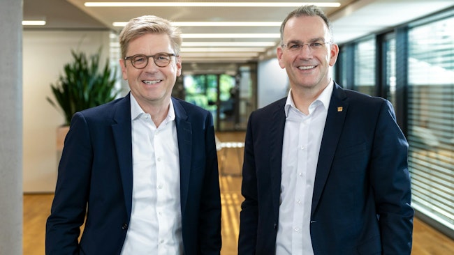 Dr. Mats Gökstorp (left), chairman of the executive board at SICK AG, and Dr. Peter Selders, CEO of the Endress+Hauser Group.